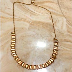Lovely Kendra Scott Rose Gold colored necklace.
